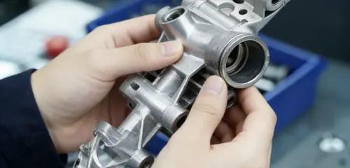 Engineer inspecting premium vacuum cast component