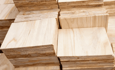 Stack of light-colored wood planks