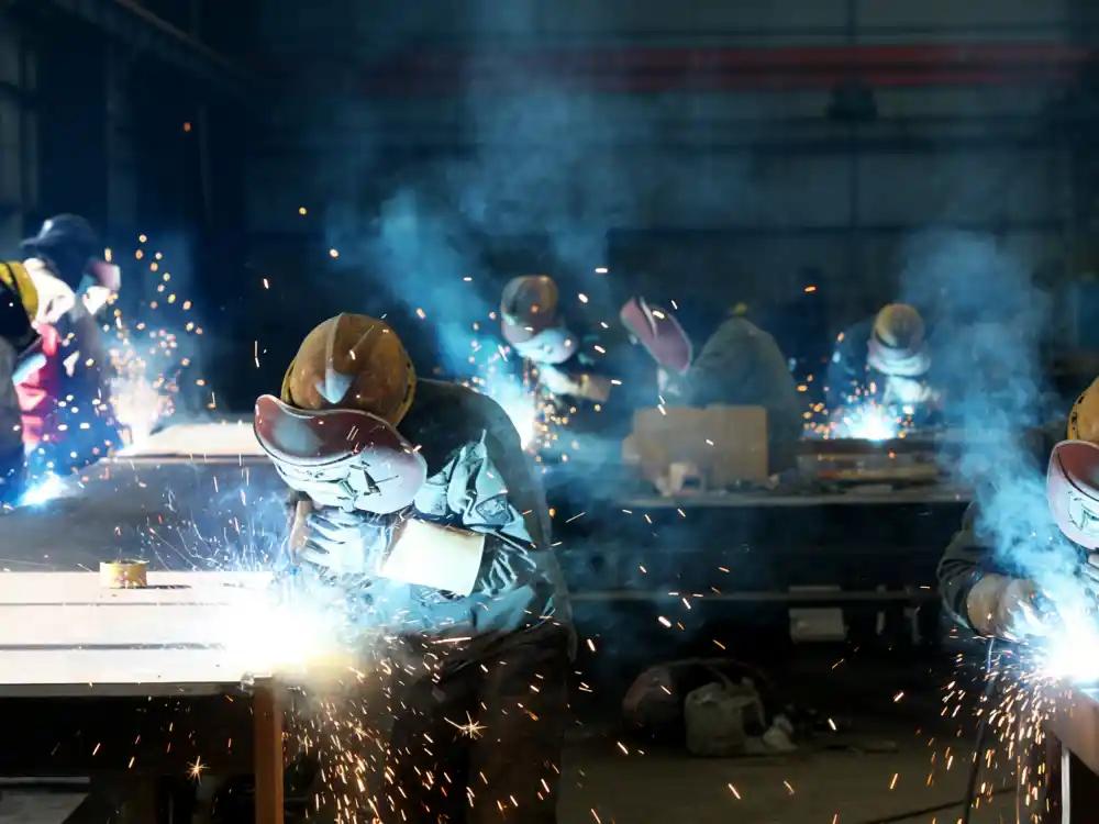 Precision welding operation on structural metal components in the machine shop