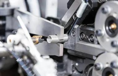 Compression spring manufacturing machine