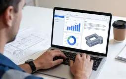 DFM analysis engineers reviewing industrial component designs